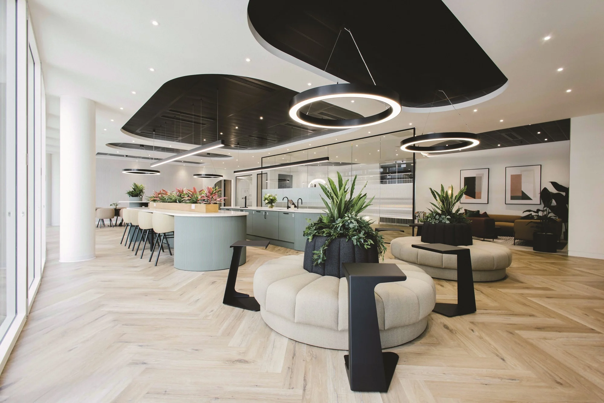 51 Lime Street breakout space with HALO BOYA 90 ring pendants and linear lighting